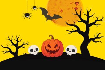 una zucca con teschi, ragni e pipistrelli tutt'attorno