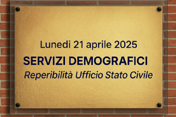 Cartello dorato fissato su un muro di mattoni con la scritta "Lunedì 21 aprile 2025 - Servizi Demografici - Reperibilità Ufficio Stato Civile"